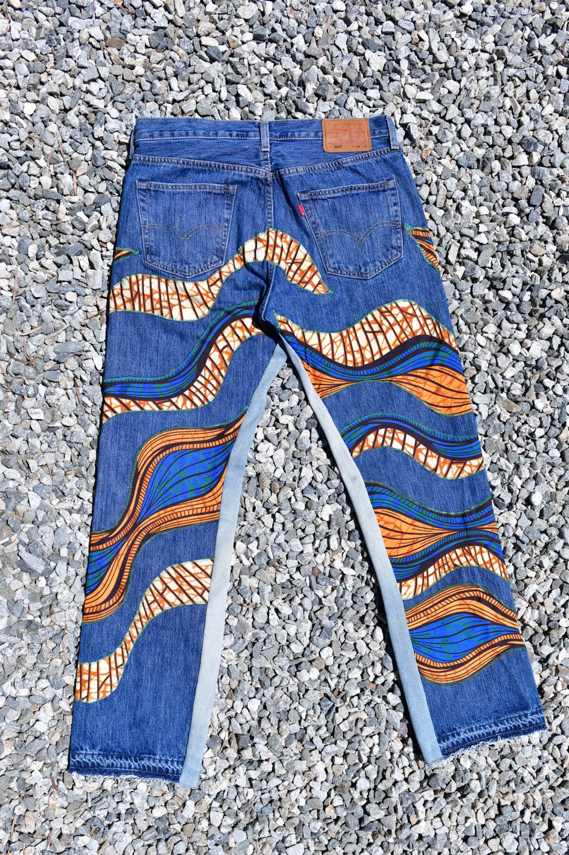 003 REWORKED JEANS - W34