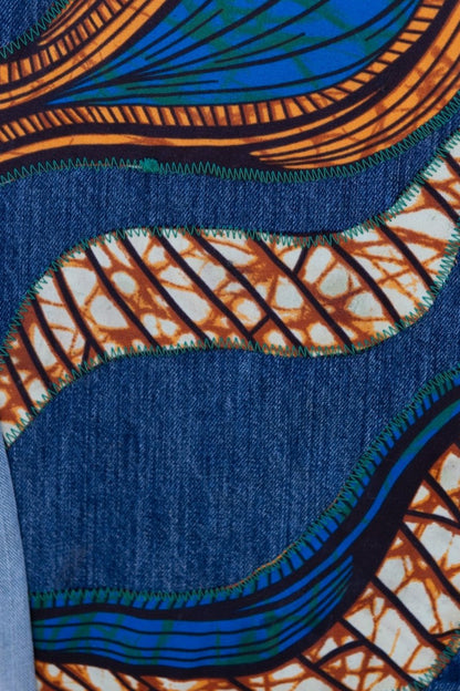 003 REWORKED JEANS - W34