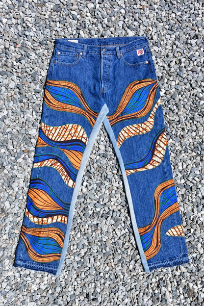 003 REWORKED JEANS - W34