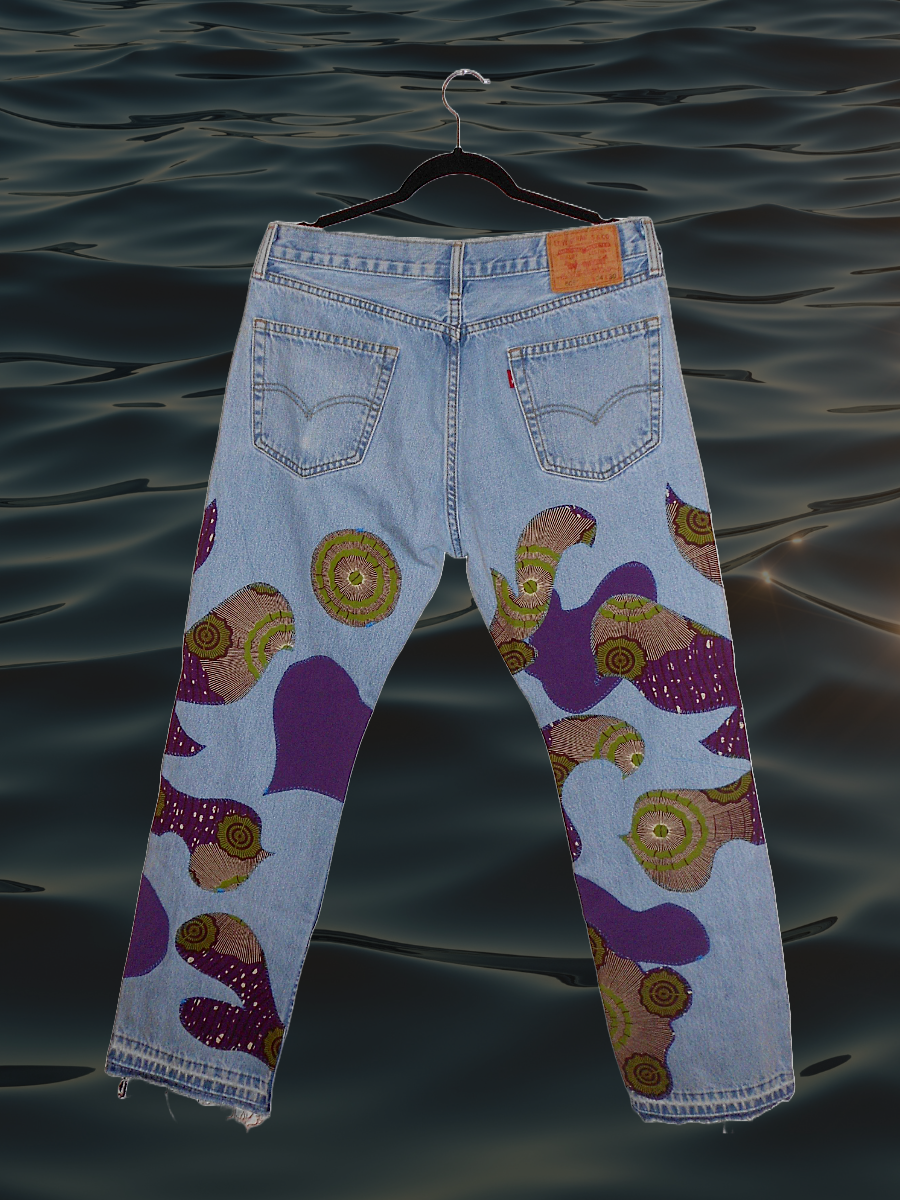 004 REWORKED JEANS - W34